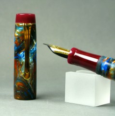 Scribe in Mineral Sea Lava Explosion #3 and Burgundy Scribe #2 in Mardi Gras Lava Explosion #3 & Golden Orange