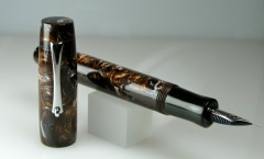 Balladeer in Copper Ore Lava Lamp alumilite with Ebonite grip Balladeer in Copper Ore Lava Lamp alumilite with Ebonite grip