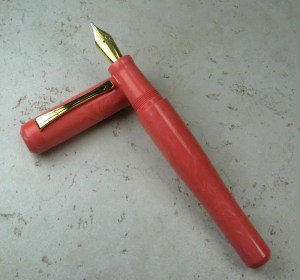 Custom Minimalist in Coral Alumilite, postable