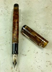 Exemplar in Illuminated Amber Tortoise with Bronze trim - Small