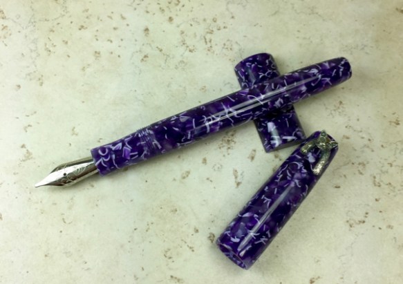 Wordsmith in Conway Stewart Flecked Amethyst, Cat Roll Stop - Small