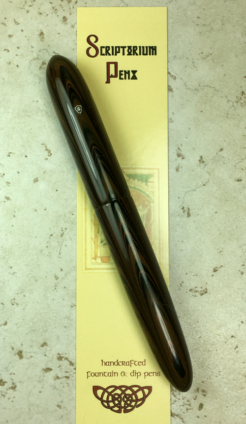 Zephyr in Orange Ripple Ebonite - Medium