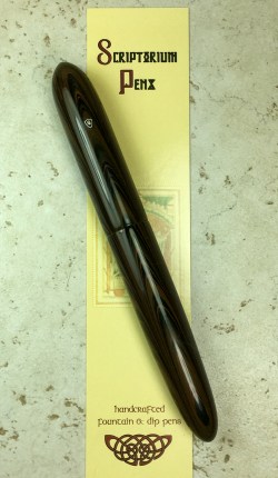 Zephyr in Orange Ripple Ebonite - Medium