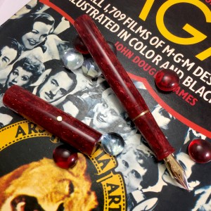 Aeterna in Red Stardust Acrylic, 18k Gold Iota Roll Stop & Section Band, Extended Section - Medium