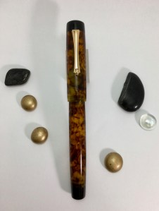 Exemplar in Illuminated Amber Tortoise & Black Ebonite - Medium
